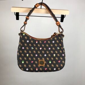 Dooney and Bourke white with brown trim small Kiley hobo bag